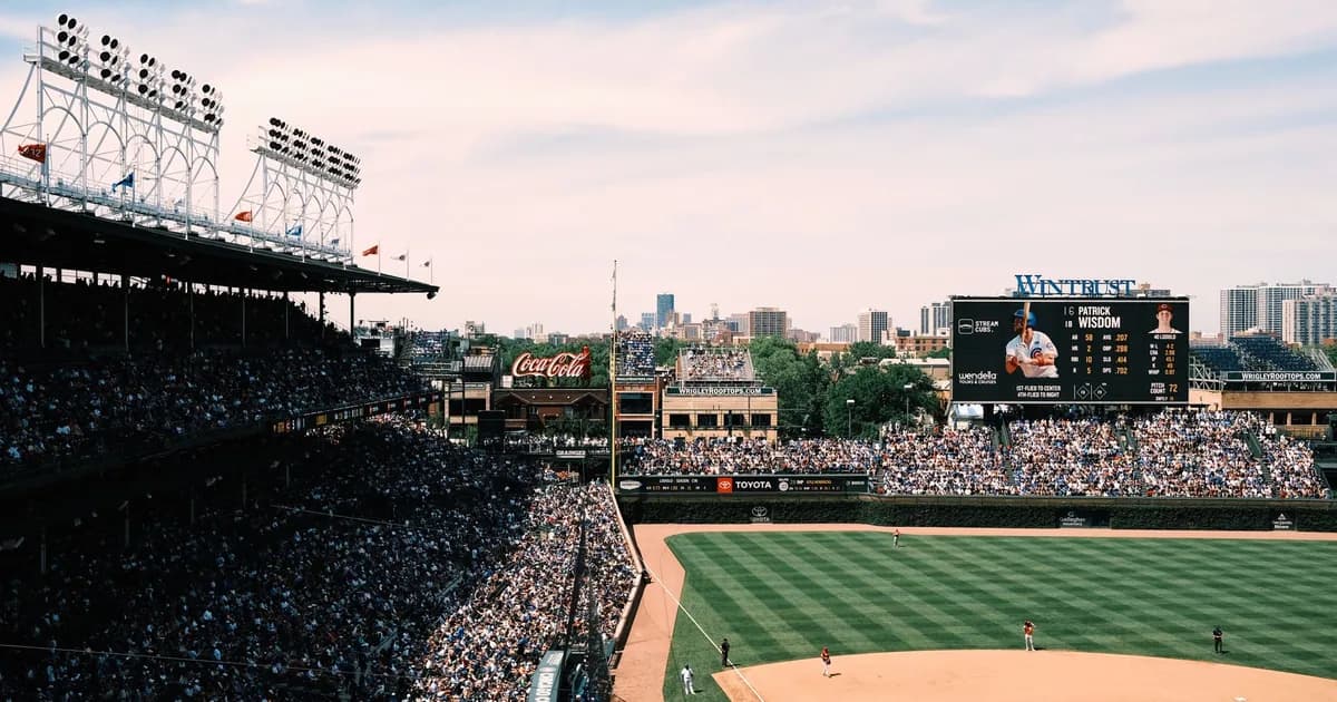 Aerial view of a crowded baseball game in a large city stadium